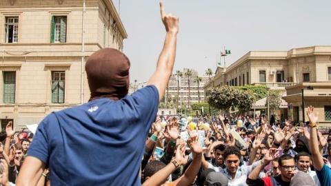 A group of Egyptians stage demonstration against Egypt's el-Sisi government at Cairo University in Giza, Egypt on April 19, 2015. (Stringer/Anadolu Agency/Getty Images)
