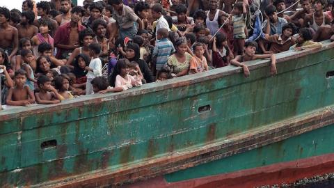 Rohingya migrants on a boat drifting in Thai waters off the southern island of Koh Lipe in the Andaman, May 14, 2015. (CHRISTOPHE ARCHAMBAULT/AFP/Getty Images)