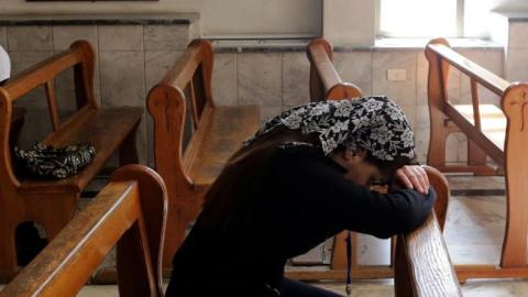 Displaced Assyrians at the Ibrahim-al Khalil Melkite Greek Catholic church in the Jaramana district on the outskirts of the capital Damascus on March 1, 2015. (LOUAI BESHARA/AFP/Getty Images)