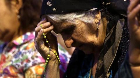 Iraqi Christians, who fled the violence in the northern Iraqi city of Mosul, attend a mass on May 31, 2015 in Arbil, Iraq. (SAFIN HAMED/AFP/Getty Images)