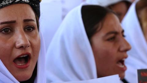 Iraqi Yazidis protest outside the United Nations office in Arbil, Iraq, on August 2, 2015 in support of women from their community who were kidnapped by ISIS. (SAFIN HAMED/AFP/Getty Images)