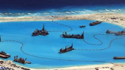 A handout picture by the Armed Forces of the Philippines (AFP) Public Affairs Office shows construction at Kagitingan (Fiery Cross) Reef in the disputed Spratley Islands in the south China Sea by China. Photo: EPA