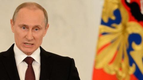 Russia's President Vladimir Putin addresses a joint session of Russian parliament in the Kremlin, Moscow, March 18, 2014. (KIRILL KUDRYAVTSEV/AFP/Getty Images)