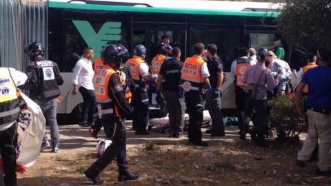 Police and emergency medical services treat the victims of a terror attack in the Armon Hanatziv neighborhood in Jerusalem on Oct. 13, 2015. (Israel Police)