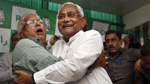 RJD Chief Lalu Prasad Yadav and Nitish Kumar celebrate after Mahagathbandhan's (Grand Alliance) victory in Bihar assembly elections at RJD office, on November 8, 2015 in Patna, India. (Arun Sharma/Hindustan Times via Getty Images)