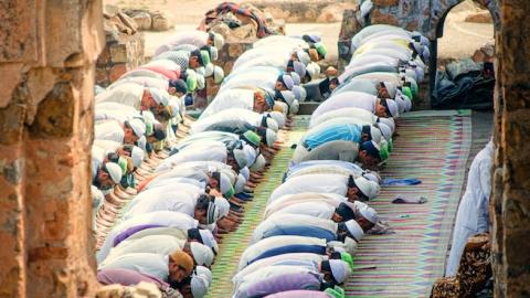 Friday prayers at Feroz Shah Kotla Mosque, a fortress built by Sultan Feroz Shah Tughlaq to house his version of Delhi city called Ferozabad. (Getty Images)