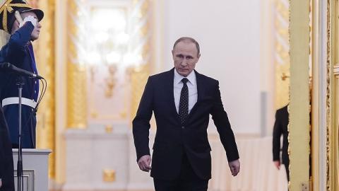Russian President Vladimir Putin enters the Federal Assembly in Grand Kremlin Palace in Moscow on December 3, 2015. (Sasha Mordovets/Getty Images