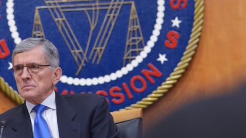 Federal Communications Commission Chairman Tom Wheeler listens to a speaker during a FCC hearing on the net neutrality on February 26, 2015 in Washington, DC. (MANDEL NGAN/AFP/Getty Images)