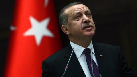 Turkey's Prime Minister Tayyip Erdogan addresses members of parliament during a meeting at the Turkish parliament in Ankara on February 26, 2013. (ADEM ALTAN/AFP/Getty Images)