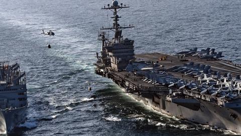 The aircraft carrier USS John C. Stennis (CVN 74) alongside the Military Sealift Command fast combat support ship USNS Rainier (T-AOE 7).  (DoD/Released)