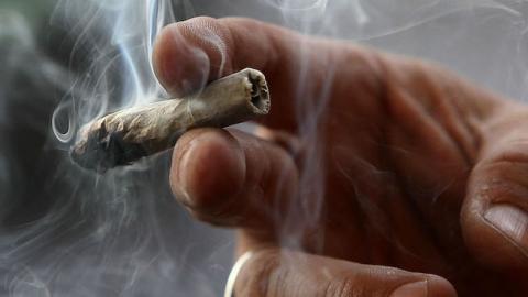 Dave Karp smokes marijuana at the Berkeley Patients Group on March 25, 2010 in Berkeley, California. (Justin Sullivan/Getty Images)