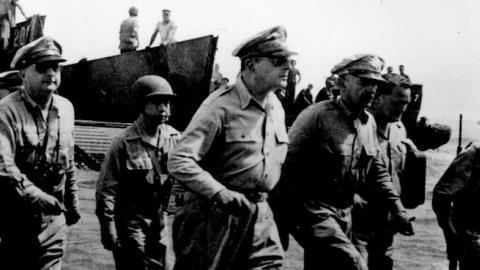 General Douglas MacArthur wades ashore during initial landings at Leyte, P.I. October 1944. (Marion Doss/Flickr)