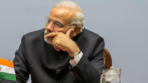 Prime Minister of India Narendra Modi listens to speeches during the inaugural session of the 18th SAARC Summit on November 26, 2014 in Kathmandu, Nepal. (Narendra Shrestha - Pool/Getty Images)