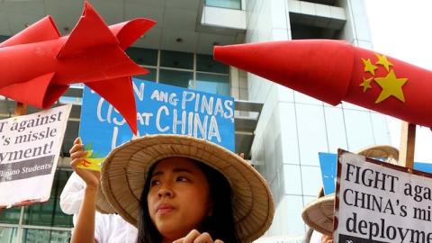 Students led by the League of Filipino Students (LFS) and Kabataan Partylist outside the Chinese Consulate to the Philippines in Makati City, February 19, 2016. (Pacific Press/LightRocket via Getty Images)