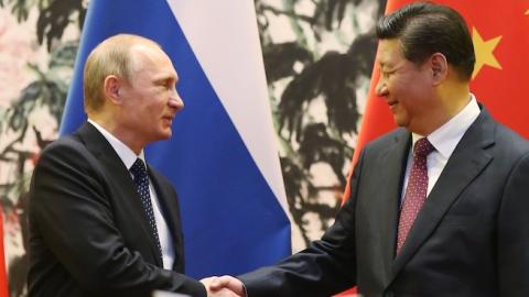 Russian President Vladimir Putin and Chinese President Xi Jinping during the Asia-Pacific Economic Cooperation (APEC) summit on November 9, 2014 in Beijing, China. (How Hwee Young - Pool/Getty Images)