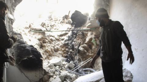 Syrian opposition members inspect the site of a suspected chlorine gas attack by Assad regime forces in Jobar region of Damascus, Syria on November 13, 2014. (Lokman Sair/Anadolu Agency/Getty Images)