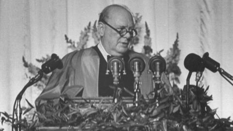 British Prime Minister Winston Churchill, wearing his academic robes and making a speech regarding the Communist threat, March 1946. (George Skadding/The LIFE Picture Collection/Getty Images)