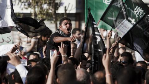 An Egyptian protester chants during a protest following midday prayers in Tahrir Square on September 14, 2012 in Cairo, Egypt. (Ed Giles/Getty Images)