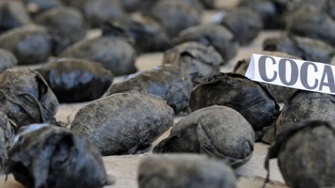 A shipment of cocaine seized in a large clandestine laboratory for the production of the drug, during its presentation to the press on March 16, 2013, at the military air base in Tumaco, Narino department, Colombia. (GUILLERMO LEGARIA/AFP/Getty Images)