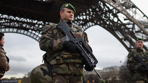 French troops patrol around the Eiffel Tower on January 12, 2015 in Paris, France. (Jeff J Mitchell/Getty Images)