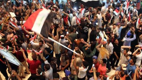 Thousands of protesters storm parliament in Baghdad's Green Zone on April 30, 2016. (Haydar Hadi/Anadolu Agency/Getty Images)