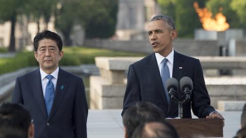 US President Barack Obama delivers remarks after laying a wreath at the Hiroshima Peace Memorial Park as Japan's Prime Minister Shinzo Abe (L) looks on, in Hiroshima on May 27, 2016. (JIM WATSON/AFP/Getty Images)