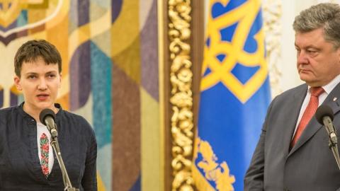 Ukrainian military pilot Nadiya Savchenko (L) joins Ukrainian president Petro Poroshenko at the Presidential Administration building following Savchenko's return to Ukraine on May 25, 2016 in Kiev, Ukraine. (Brendan Hoffman/Getty Images)