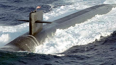 The Navy's nuclear ballistic submarine USS Maine conducts surface navigational operations about 50 miles south of Puerto Rico. (U.S. Navy photo)