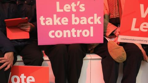 Vote Leave supporters wait for London Mayor Boris Johnson to address campaigners during a rally for the 'Vote Leave' campaign on April 15, 2016 in Manchester, England. (Christopher Furlong/Getty Images)