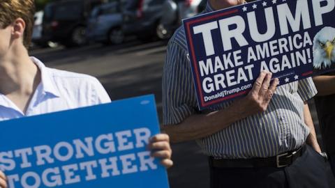 Donald Trump and Hillary Clinton supporters in Portsmouth, N.H., July 12, 2016. (Keith Bedford/The Boston Globe via Getty Images)