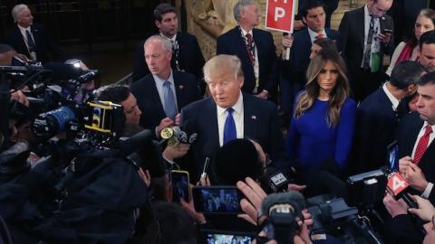 Republican presidential candidate Donald Trump greets reporters at the Fox Theatre on March 3, 2016 in Detroit, Michigan. (Chip Somodevilla/Getty Images)