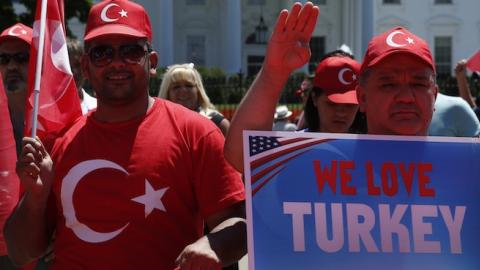 Supporters of Turkish President Recep Tayip Erdogan rally outside the White House in Washington, DC on July 17, 2016. (Photo: YURI GRIPAS/AFP/Getty Images)