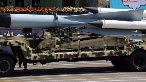 A S-200 surface-to-air missile is driven past Iranian military commanders during the annual military parade on September 22, 2015, in the capital Tehran. (ATTA KENARE/AFP/Getty Images)