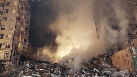 General view of an apartment block in Pechatniki suburb, southeast of Moscow, after an explosion destroyed four stories out of 18 of the building, September 9, 1999. (STR/AFP/Getty Images)