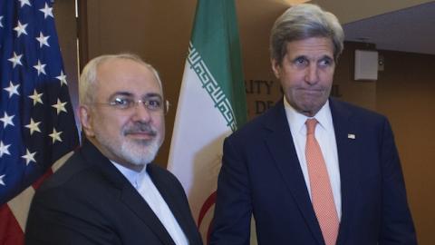 US Secretary of State John Kerry (R) with Iran's Foreign Minister Mohammad Javad Zarif April 19, 2016 at the United Nations in New York. (DON EMMERT/AFP/Getty Images)