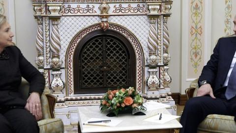 US Secretary of State Hillary Clinton (L) meets with Russian Prime Minister Vladimir Putin (R) outside Moscow in Novo-Ogarevo on March 19, 2010. (ALEXEY NIKOLSKY/AFP/Getty Images)