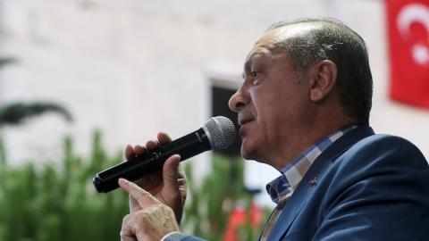 Turkish President Recep Tayyip Erdogan addresses citizens outside his residence at Kisikli Neighborhood following the failed coup attempt, in Istanbul, Turkey on July 16, 2016. (Elif Ozturk/Anadolu Agency/Getty Images)