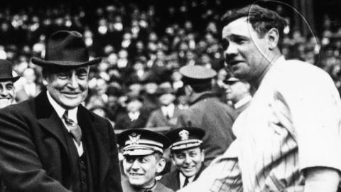 Babe Ruth shakes hands with the 29th President of the USA, Warren Harding. (Keystone/Getty Images)