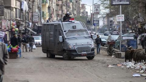 Members of the Egyptian police special forces patrol streets in al-Haram neighborhood in the southern Cairo Giza district on January 25, 2016. (MAHMOUD KHALED/AFP/Getty Images)