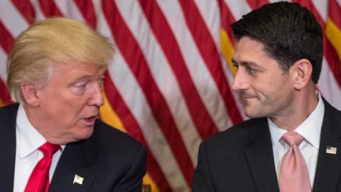 House Speaker Paul Ryan listens to US President-elect Donald Trump speak to the press at the Capitol in Washington, DC, on November 10, 2016. (NICHOLAS KAMM/AFP/Getty Images)