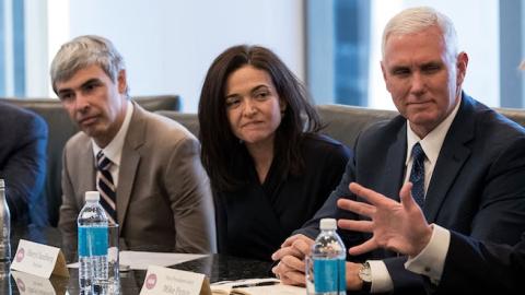 (L to R) Jeff Bezos, Larry Page, Sheryl Sandberg, Vice President-elect Mike Pence listen as President-elect Donald Trump speaks during a meeting of technology executives at Trump Tower, December 14, 2016 in New York City. (Drew Angerer/Getty Images)