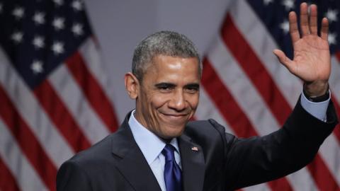 U.S. President Barack Obama waves after he spoke during the SelectUSA Investment Summit March 23, 2015 in National Harbor, Maryland. (Alex Wong/Getty Images)