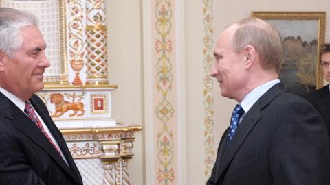 Exxon Mobil Corporation CEO Rex Tillerson and Russia's Prime Minister Vladimir Putin (L-R front) during a meeting at Novo-Ogaryovo residence, April 16, 2012. (Alexei Nikolsky\TASS via Getty Images)