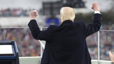 US President Donald Trump celebrates after his speech during the Presidential Inauguration at the US Capitol on January 20, 2017 in Washington, DC. (Saul Loeb - Pool/Getty Images)