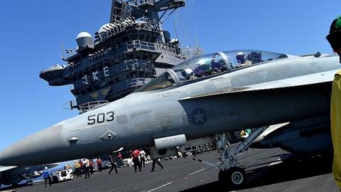 An F/A-18F Super Hornet taxis on the US navy's super carrier USS Dwight D. Eisenhower (CVN-69) ('Ike') in the Mediterranean Sea on July 6, 2016. (ALBERTO PIZZOLI/AFP/Getty Images)