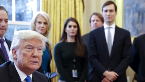 President Donald Trump signs one of five executive orders related to the oil pipeline industry in the Oval Office of the White House January 24, 2017 in Washington, DC. (Shawn Thew-Pool/Getty Images)