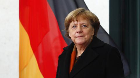 German Chancellor Angela Merkel waits for the Italian Prime Minister Paolo Gentiloni before they review a guard of honor upon Gentilon's arrival at the Chancellery on January 18, 2017 in Berlin, Germany. (Michele Tantussi/Getty Images)