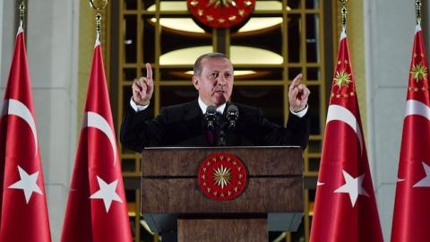President of Turkey Recep Tayyip Erdogan gives a speech during an Iftar (fast-breaking) dinner the at Presidential Complex in Ankara, Turkey, June 23, 2016. (Photo by Kayhan Ozer/Anadolu Agency/Getty Images)