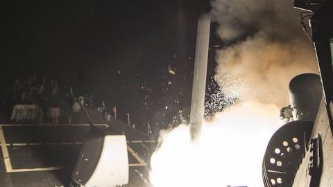 USS Ross (DDG 71) fires a tomahawk land attack missile April 7, 2017. (Robert S. Price/U.S. Navy/Handout/Anadolu Agency/Getty Images)