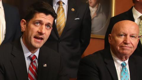 House Speaker Paul Ryan (R-WI) speaks before signing the American Manufacturing Competitiveness Act of 2016, with Ways and means Committee Chairman Kevin Brady (R-TX), (R), on Capitol Hill May 18, 2016 in Washington, DC. (Mark Wilson/Getty Images)